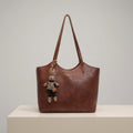 Women's Vegan Leather Shoulder Tote Bag Plush Bunny Charm - Brown